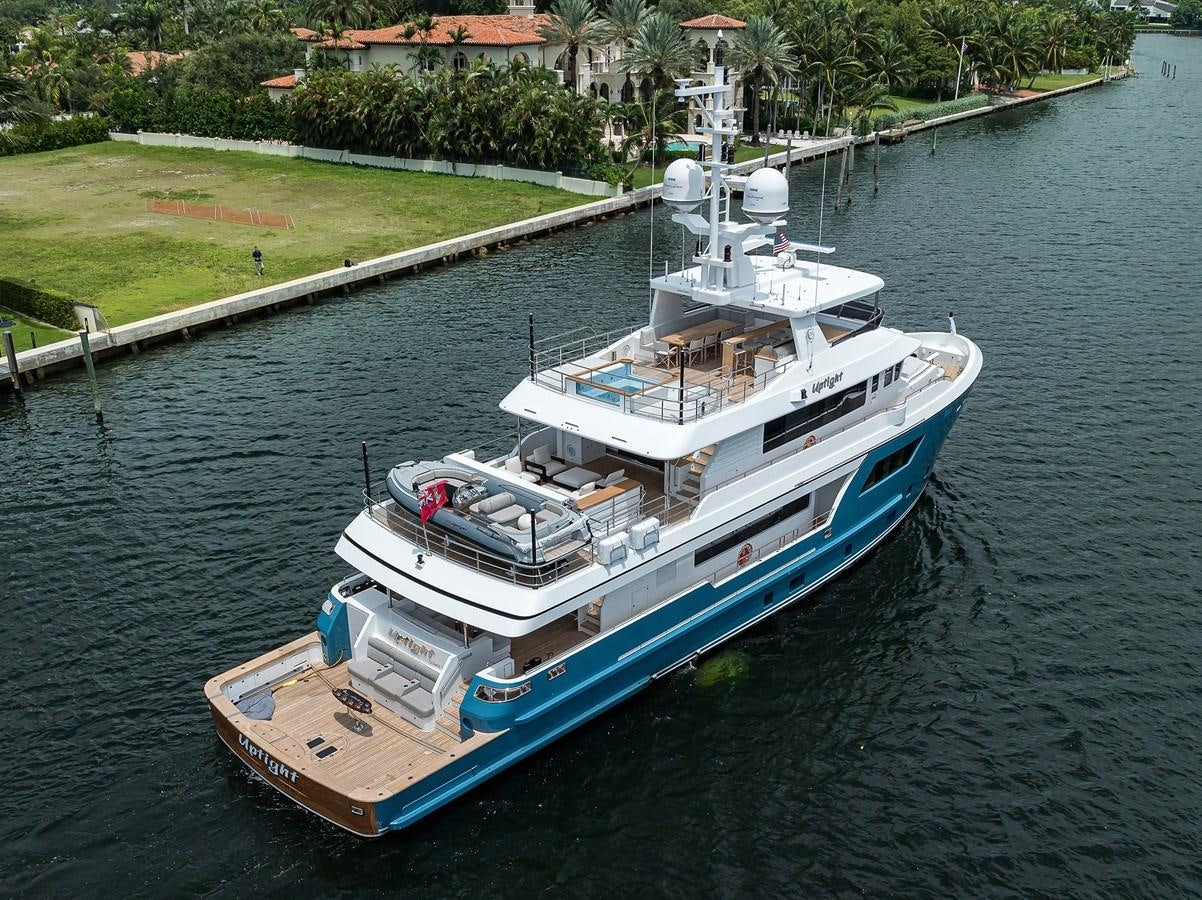 a large boat on the water aboard UPTIGHT Yacht for Sale