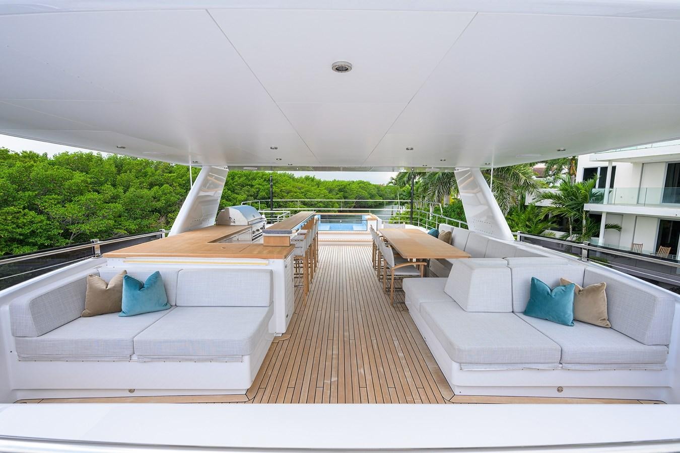 a large living room with a pool aboard UPTIGHT Yacht for Sale