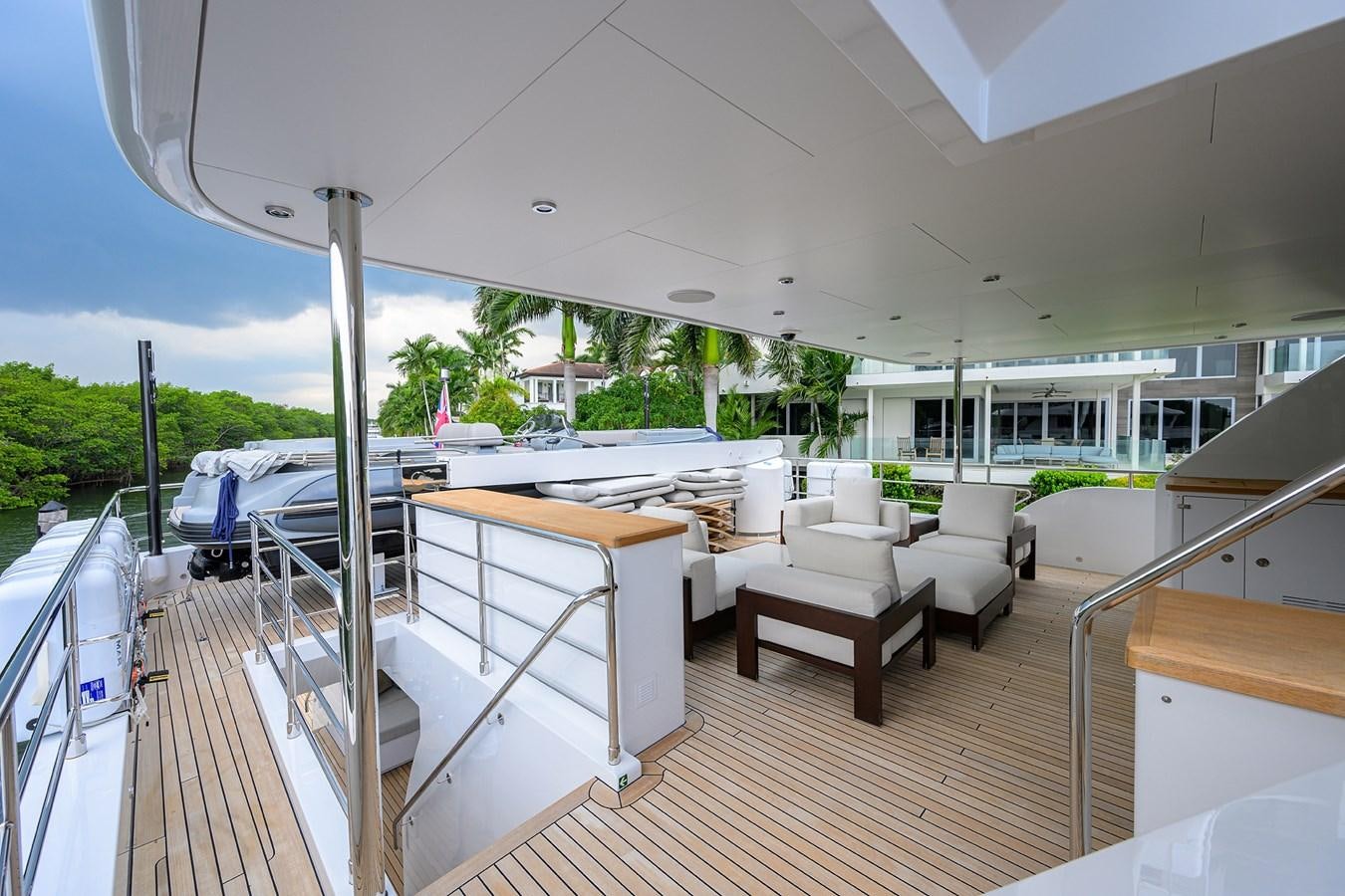a large balcony with a pool aboard UPTIGHT Yacht for Sale
