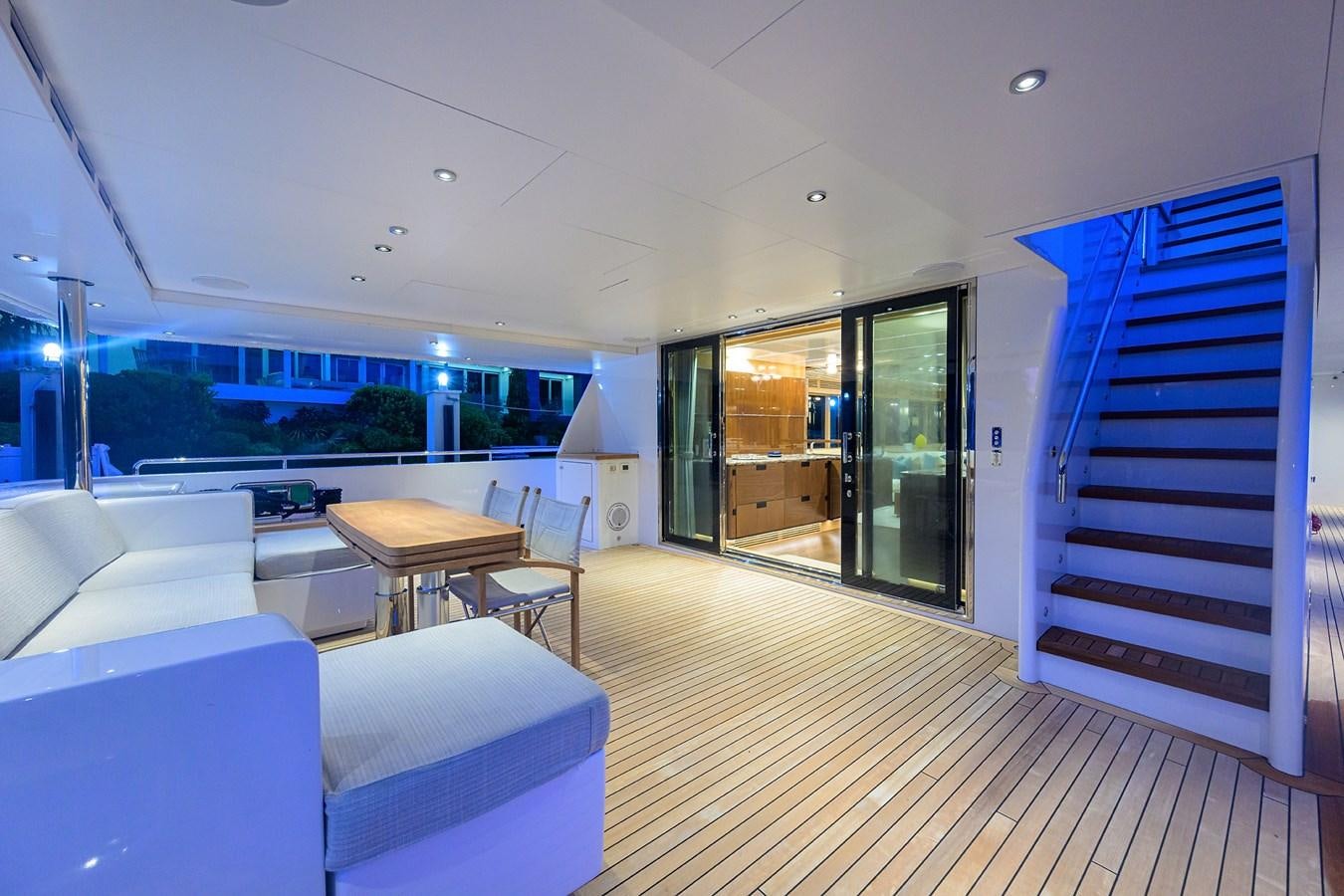 a room with a view of the water and the deck aboard UPTIGHT Yacht for Sale