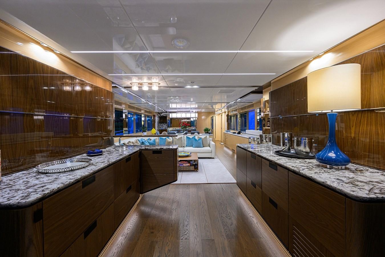 a large kitchen with a large island aboard UPTIGHT Yacht for Sale