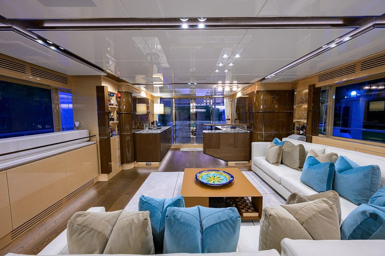 a living room with a large window aboard UPTIGHT Yacht for Sale
