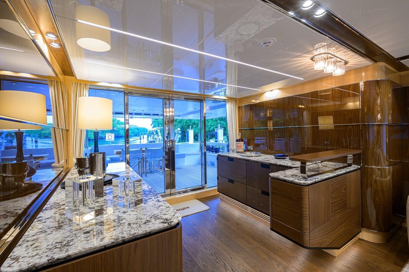 a large kitchen with glass walls aboard UPTIGHT Yacht for Sale