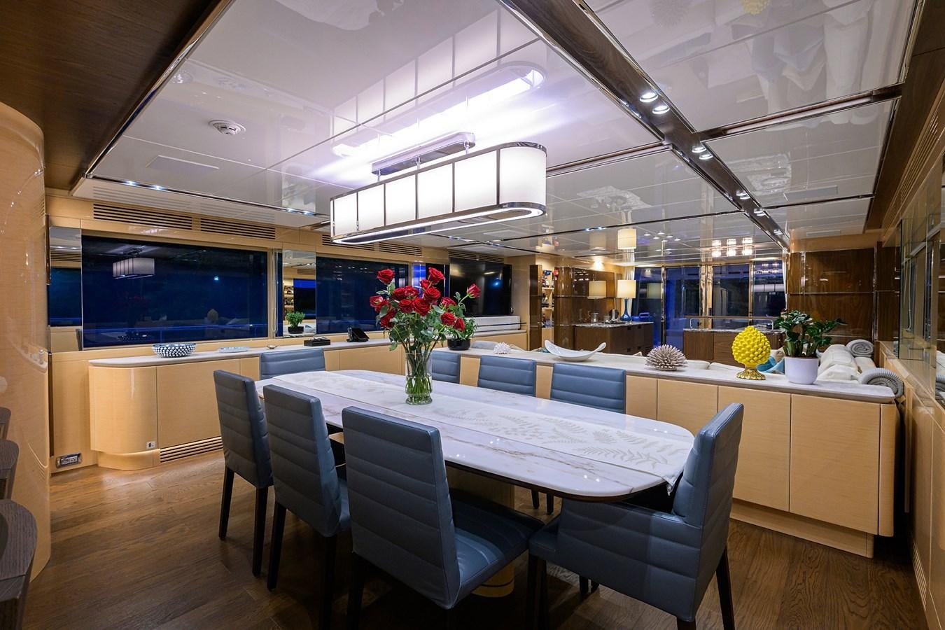 a room with a table and chairs aboard UPTIGHT Yacht for Sale
