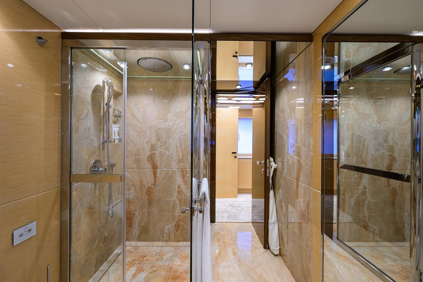 a room with glass doors aboard UPTIGHT Yacht for Sale