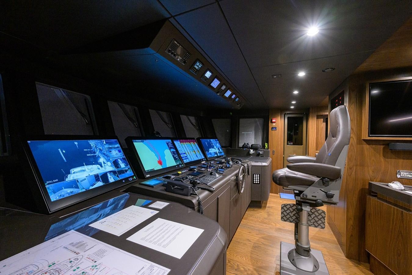 a room with several computers aboard UPTIGHT Yacht for Sale