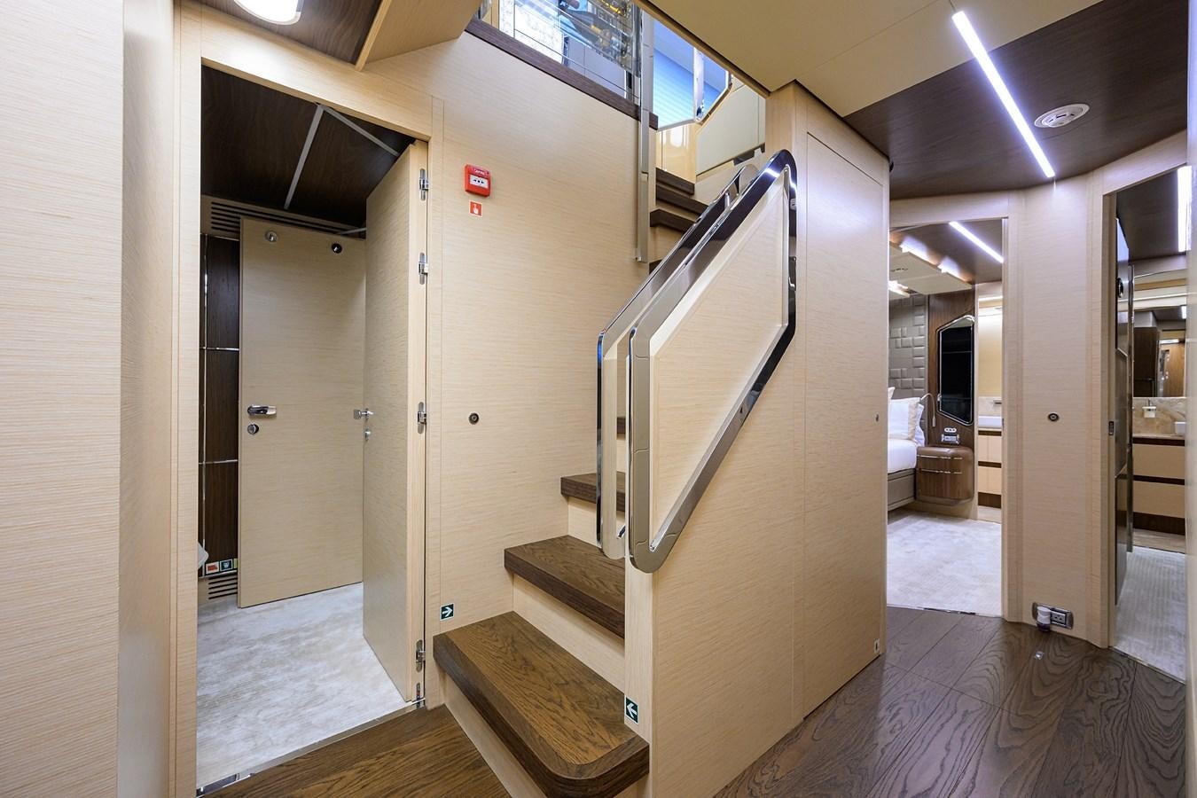 a hallway with doors and windows aboard UPTIGHT Yacht for Sale