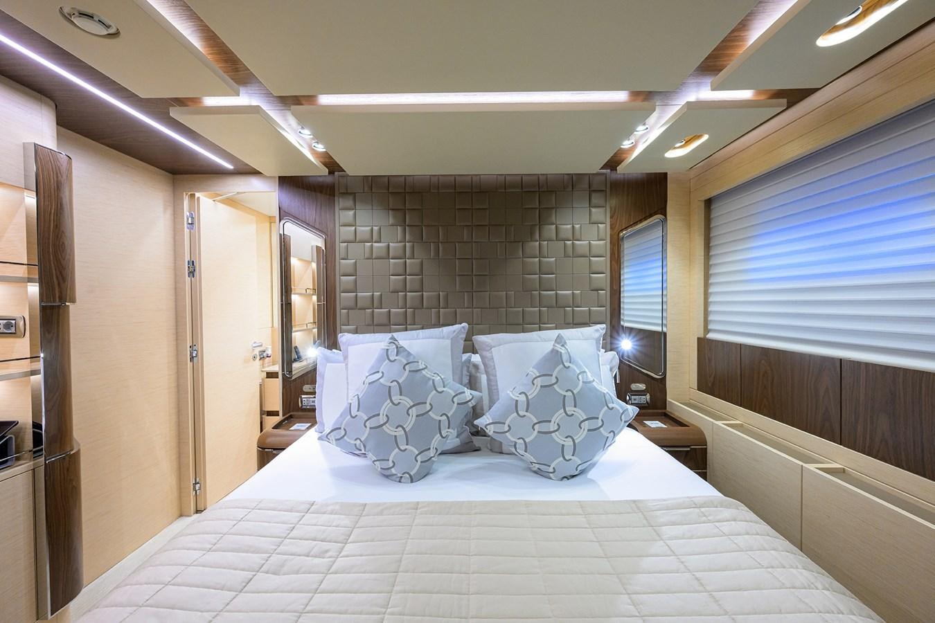 a large bed in a room aboard UPTIGHT Yacht for Sale