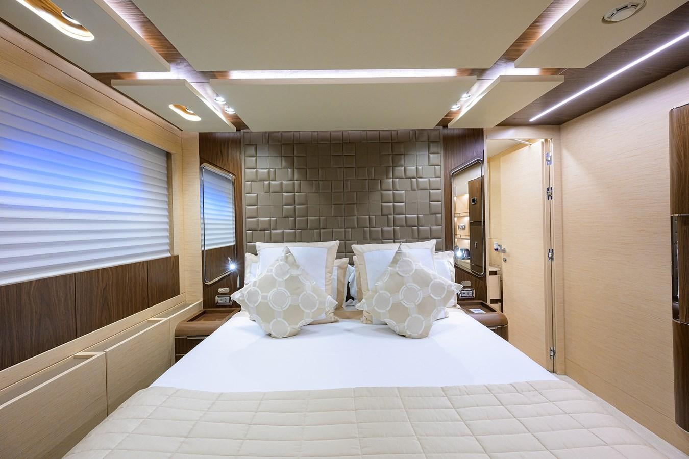 a bed in a room aboard UPTIGHT Yacht for Sale