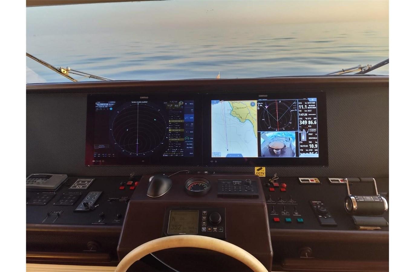 a computer with a screen and speakers aboard ZIACANAIA Yacht for Sale