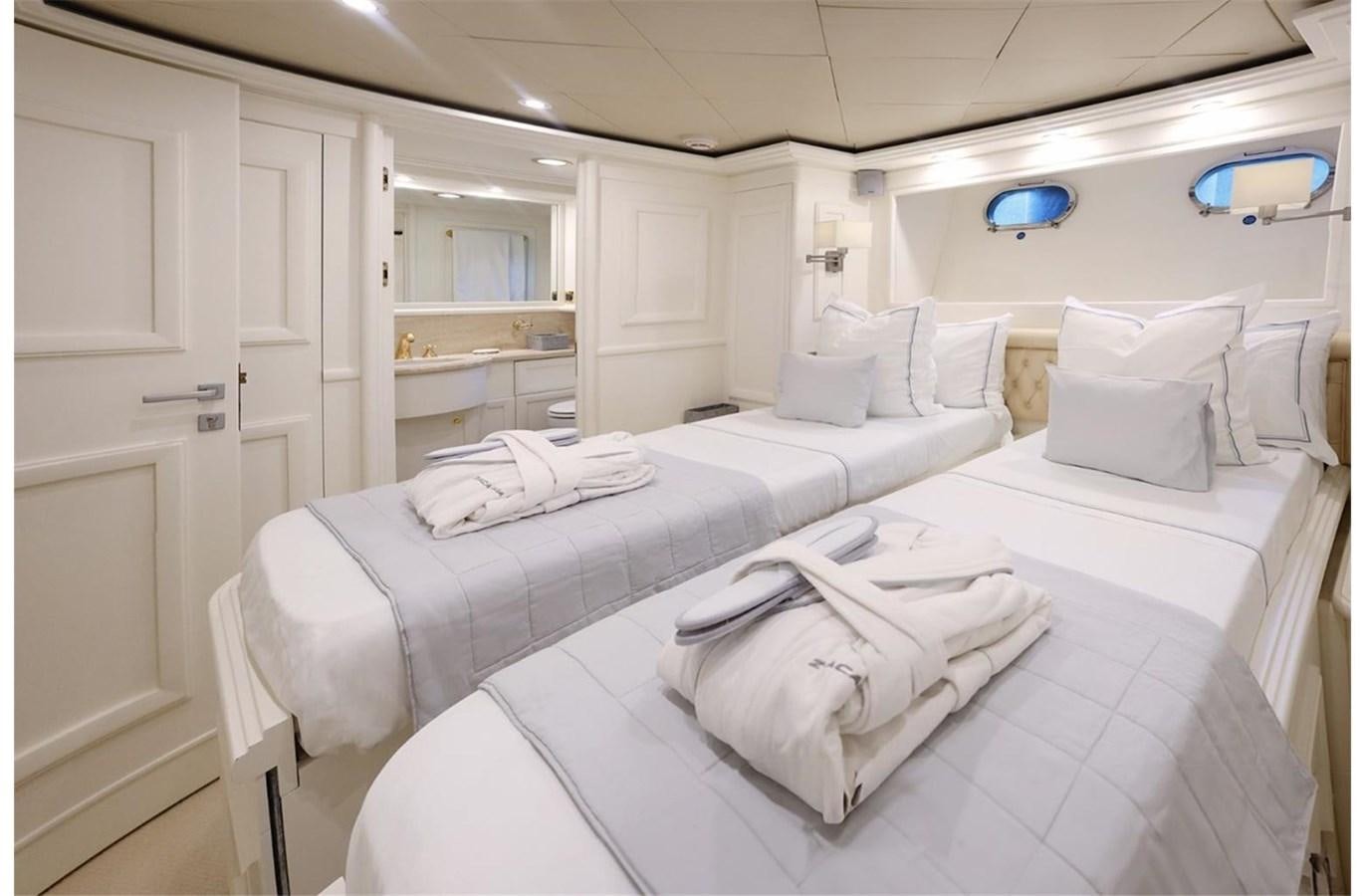 a room with two beds aboard ZIACANAIA Yacht for Sale