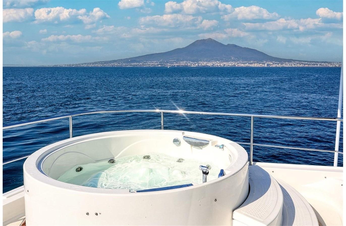 a white bathtub in a large body of water aboard ZIACANAIA Yacht for Sale