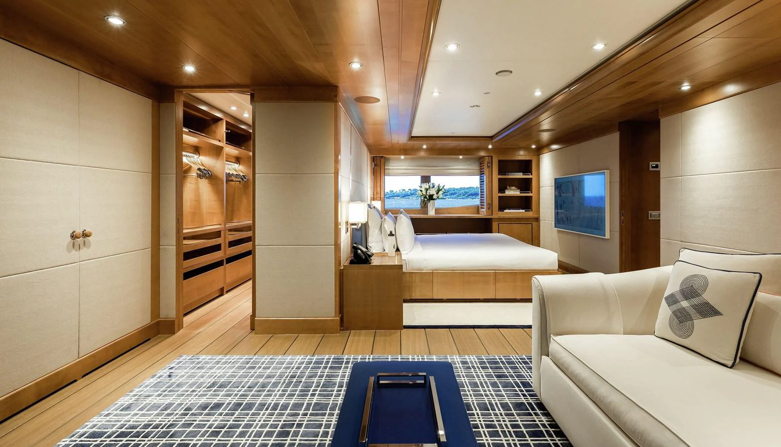 a room with a bed and a tv aboard CLELIA III Yacht for Sale