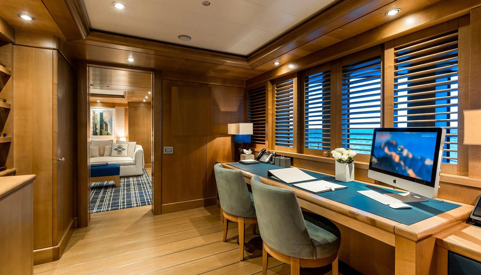 a room with a desk and a computer aboard CLELIA III Yacht for Sale