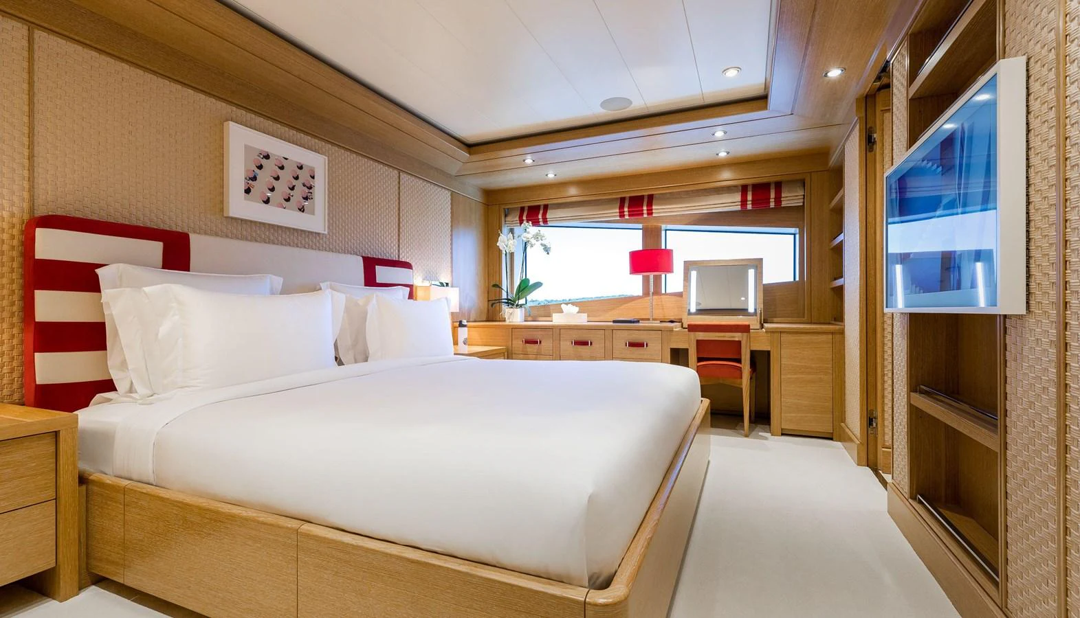 a bed in a room aboard CLELIA III Yacht for Sale