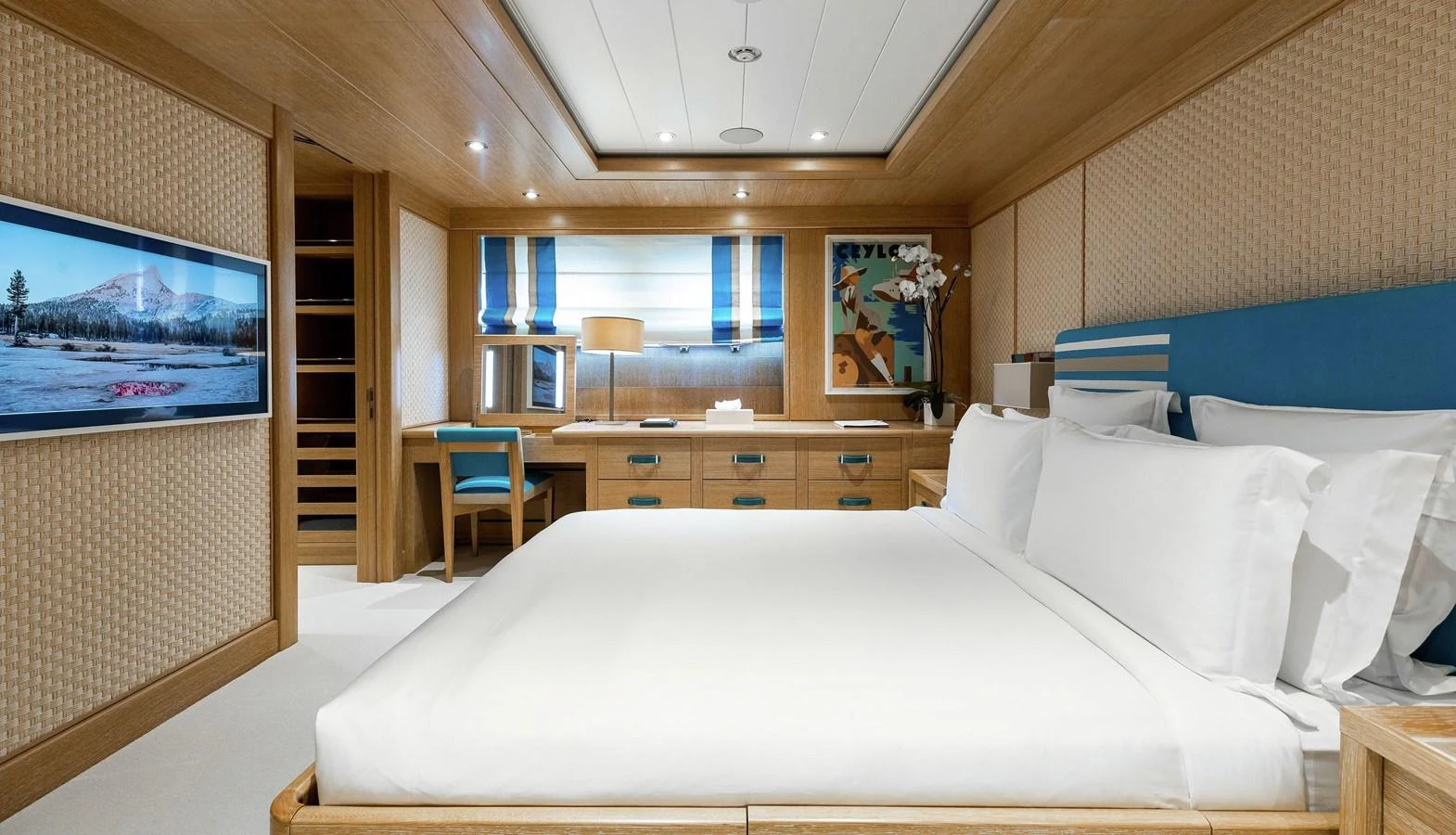 a large bed in a room aboard CLELIA III Yacht for Sale