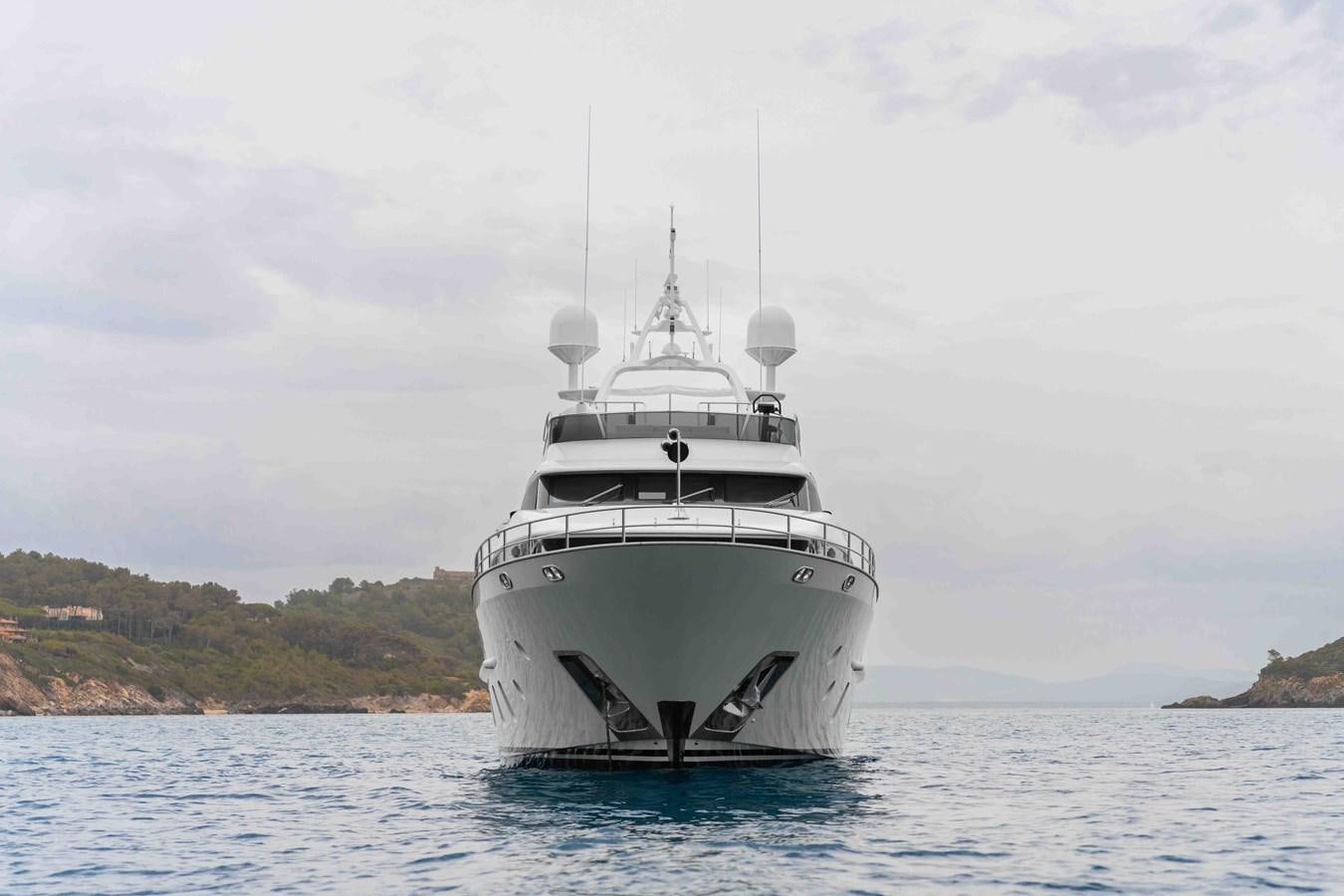 a white boat in the water aboard COCONUTS Yacht for Sale