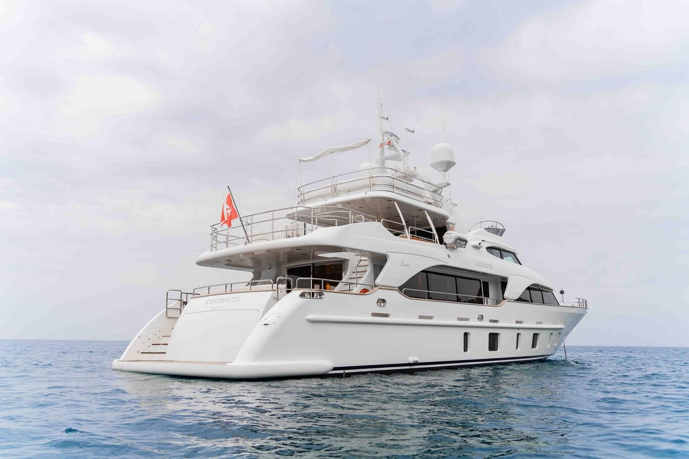 a white boat in the water aboard COCONUTS Yacht for Sale