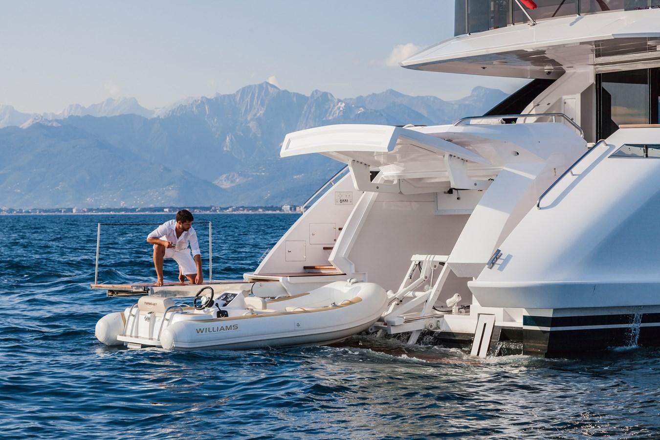 a person standing on a boat aboard DREAMLINE 35 Yacht for Sale