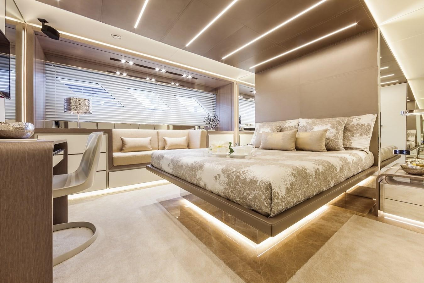 a large living room with a large bed aboard DREAMLINE 35 Yacht for Sale