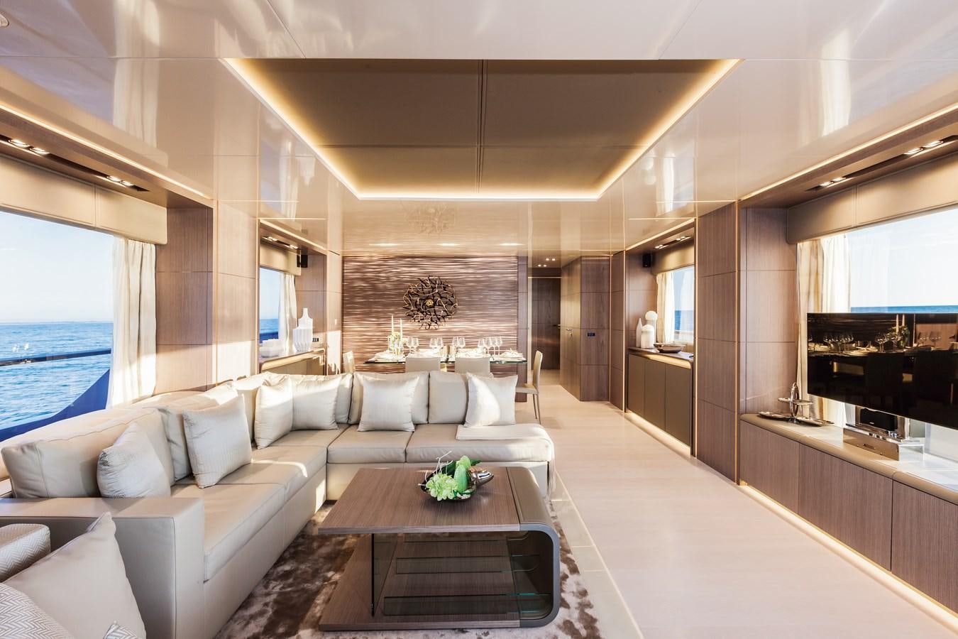 a living room with a couch and a table aboard DREAMLINE 35 Yacht for Sale