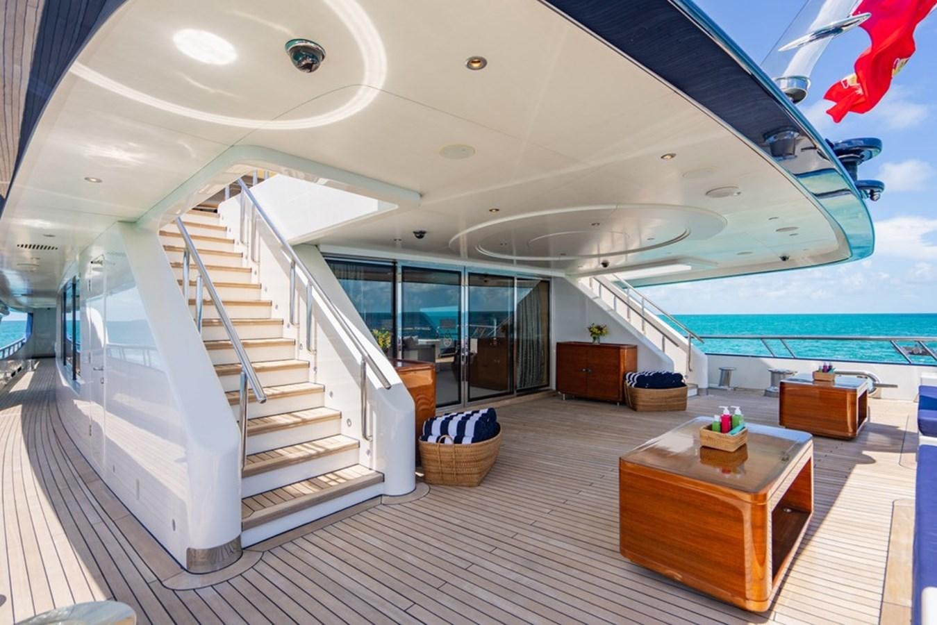 a modern house with a swimming pool aboard AMADEUS Yacht for Sale