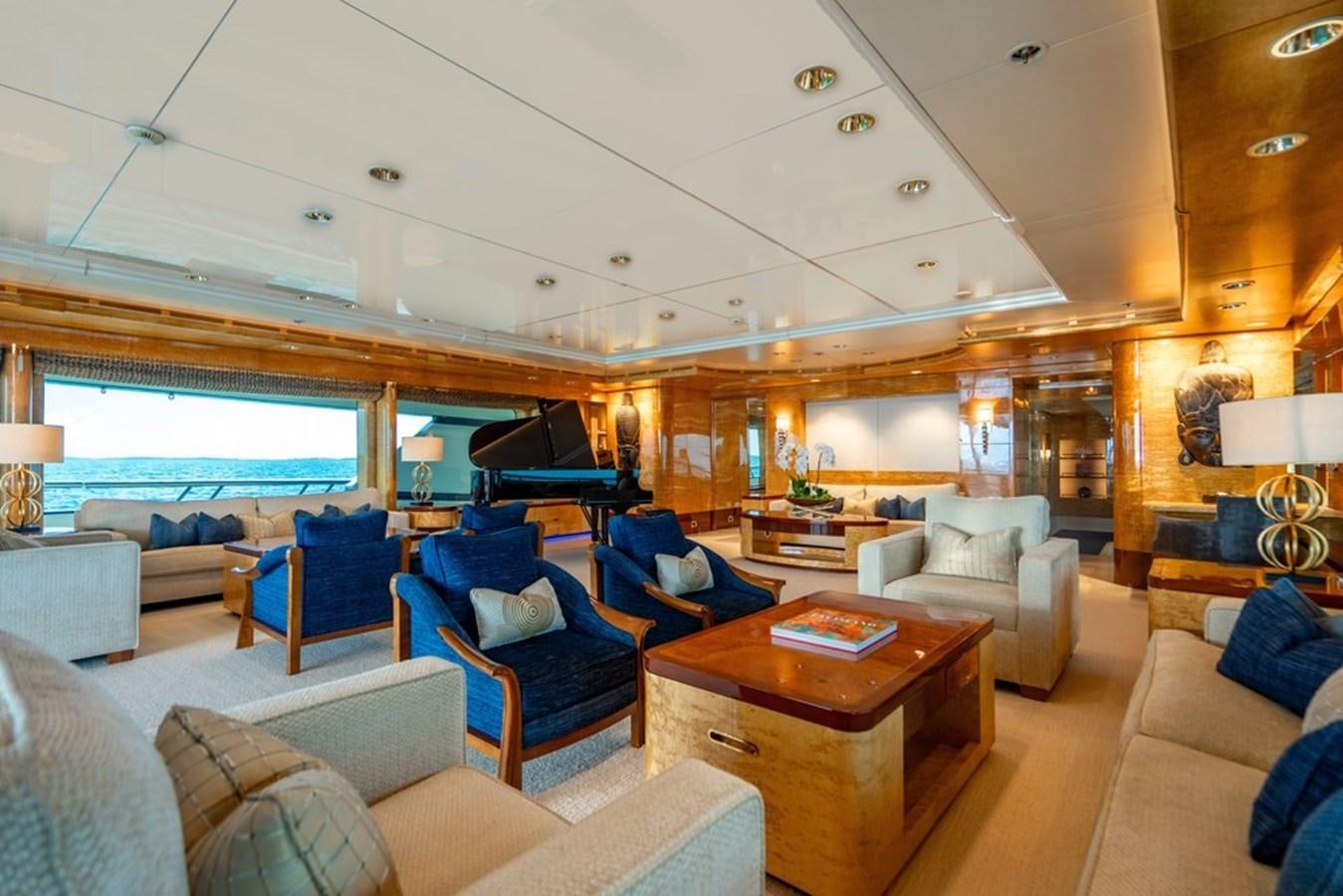 a living room with a large window aboard AMADEUS Yacht for Sale