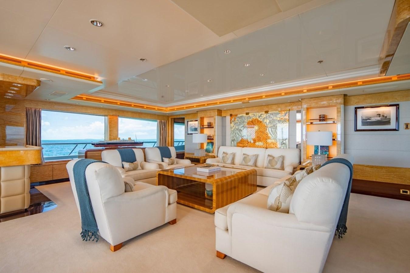 a living room with a large window aboard AMADEUS Yacht for Sale