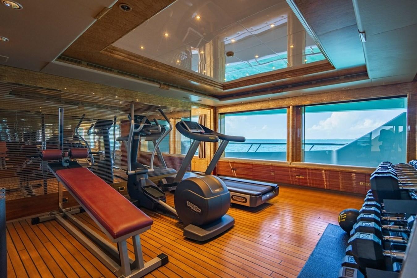 a gym with exercise equipment aboard AMADEUS Yacht for Sale