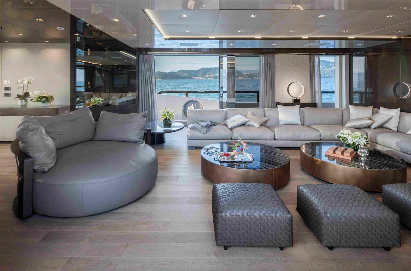 a living room with a large window aboard MA Yacht for Sale