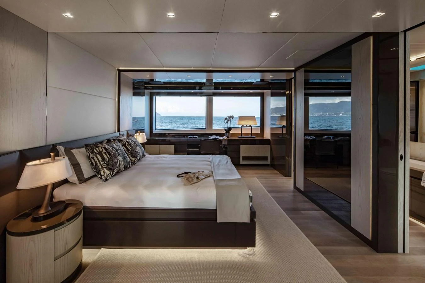 a large bedroom with a large bed aboard MA Yacht for Sale