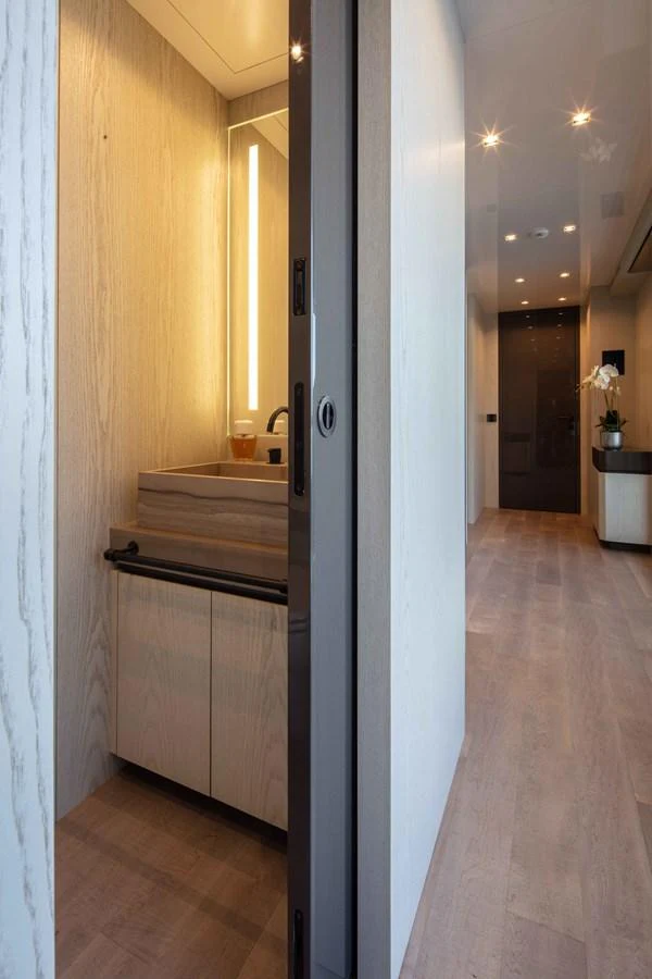 a bathroom with a sink and a mirror aboard MA Yacht for Sale