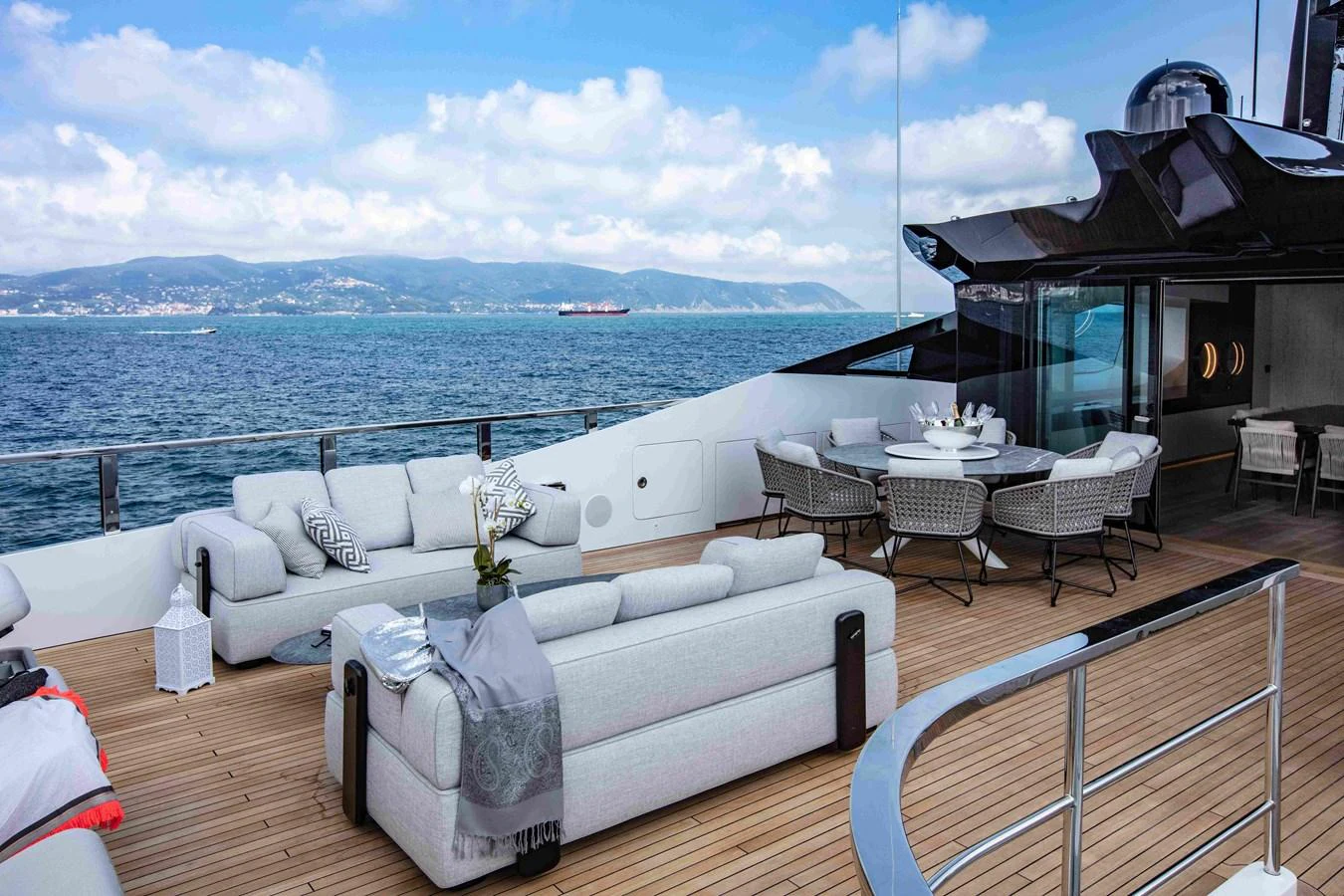 a large living room with a large body of water aboard MA Yacht for Sale