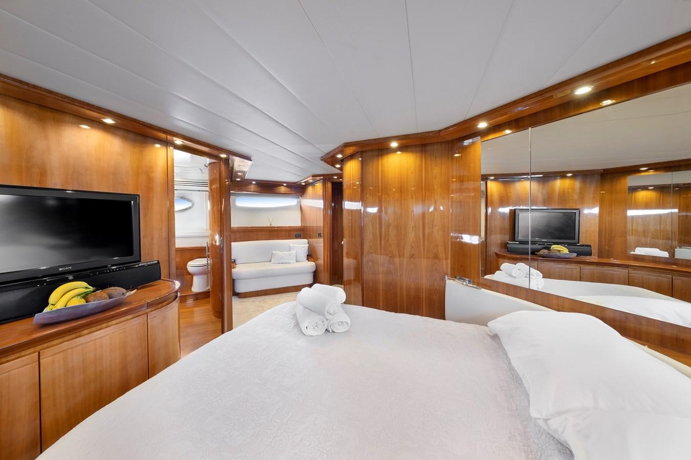 a bed in a room aboard ICE Yacht for Sale