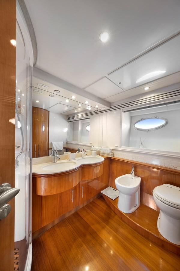a bathroom with a sink and a toilet aboard ICE Yacht for Sale