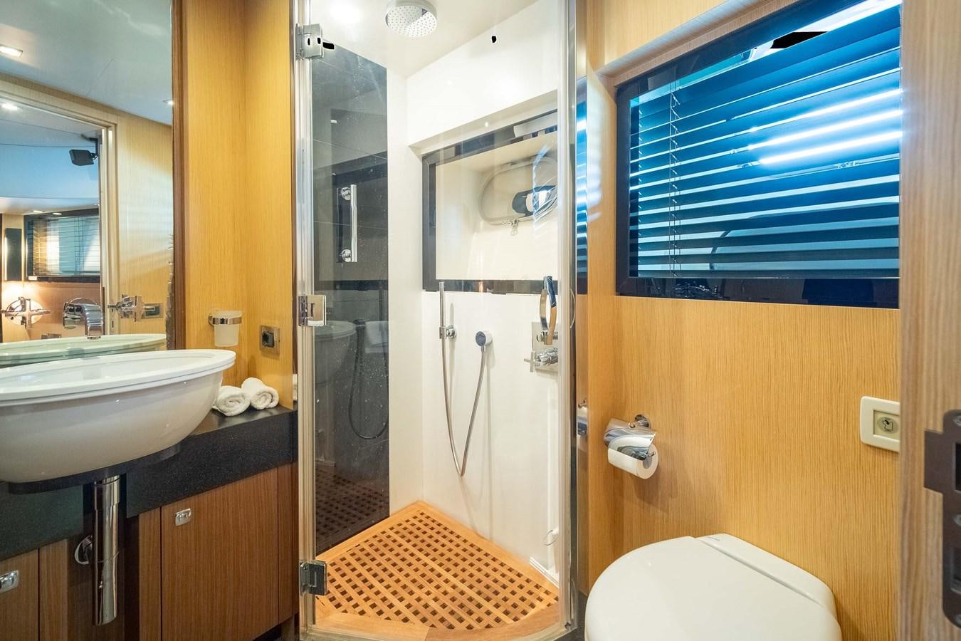 a bathroom with a sink and a toilet aboard CHARISMA Yacht for Sale