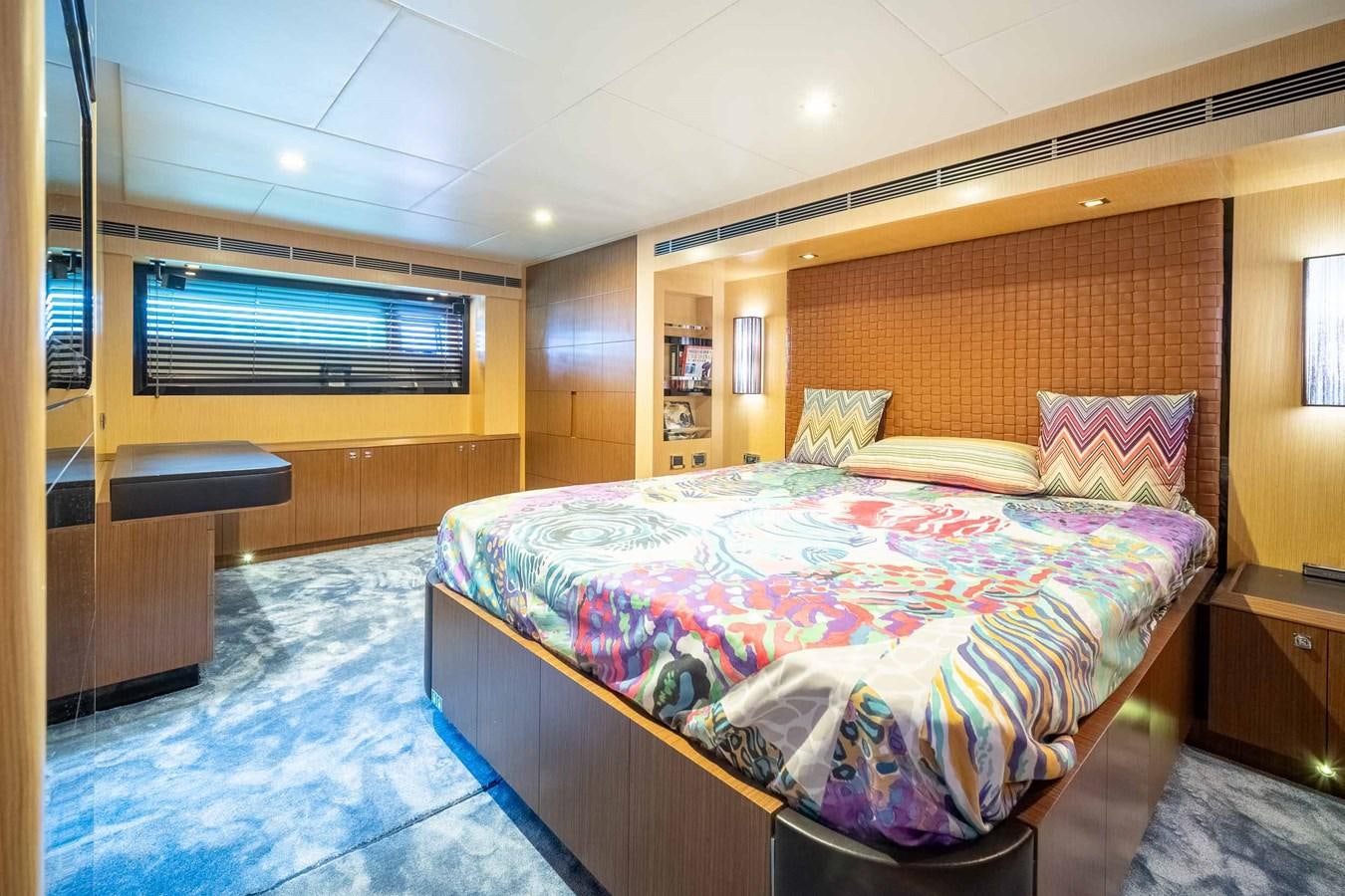 a bed in a room aboard CHARISMA Yacht for Sale