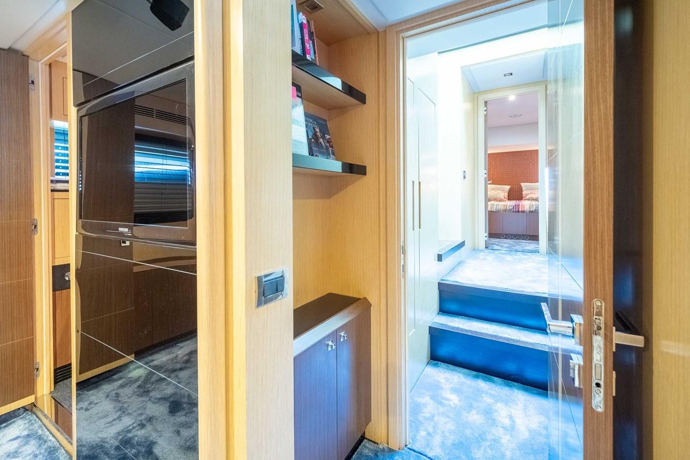 a room with a door open aboard CHARISMA Yacht for Sale