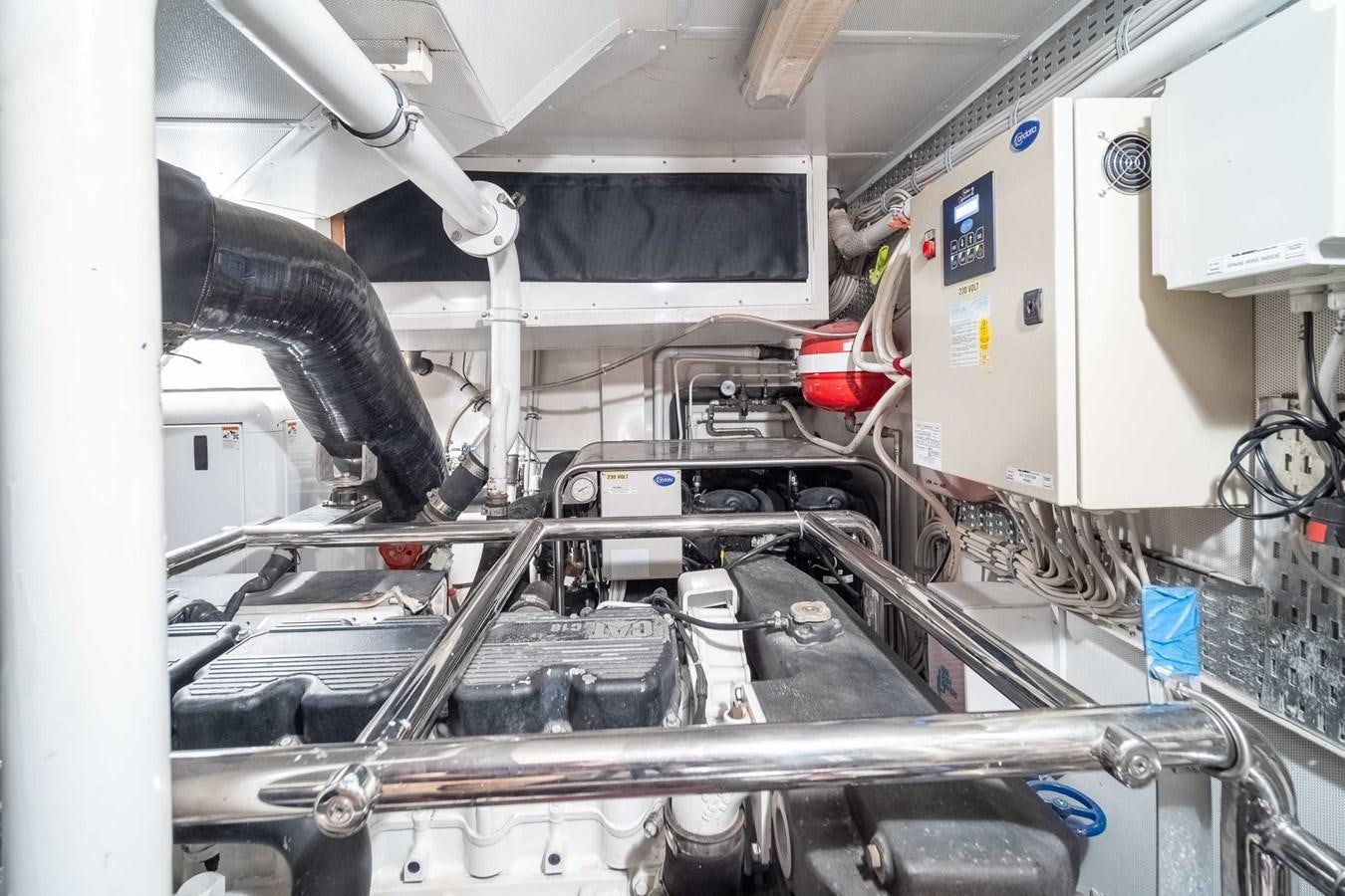 a machine in a room aboard CHARISMA Yacht for Sale