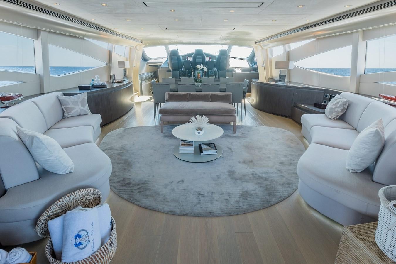 a large living room with a fish tank aboard KOLAHA TWO Yacht for Sale