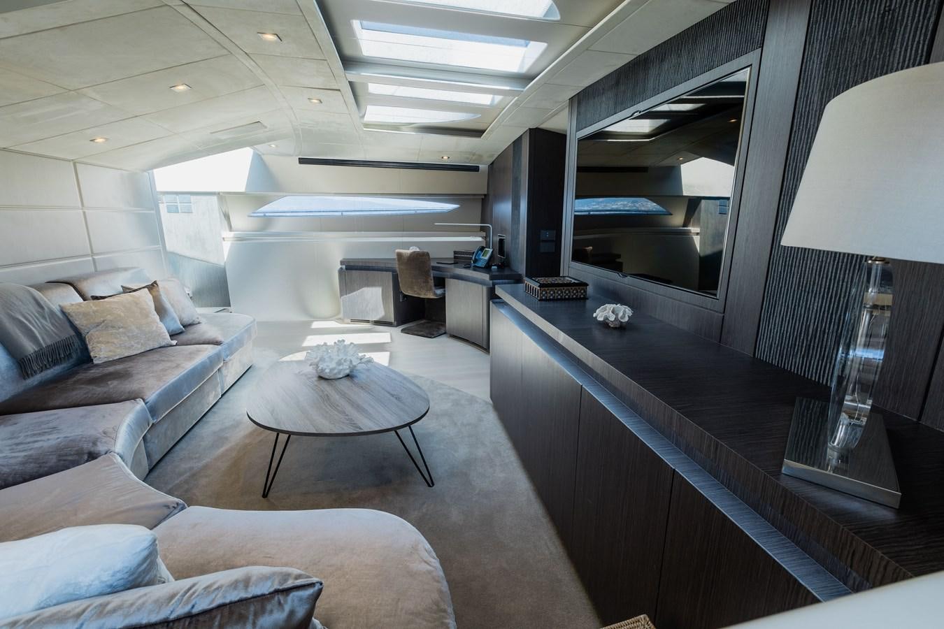 a modern looking living room aboard KOLAHA TWO Yacht for Sale