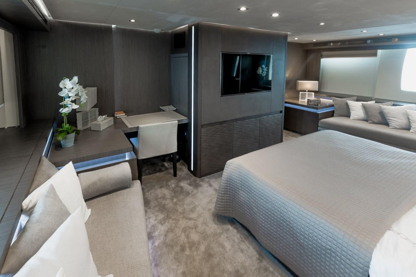 a hotel room with a bed and a tv aboard KOLAHA TWO Yacht for Sale