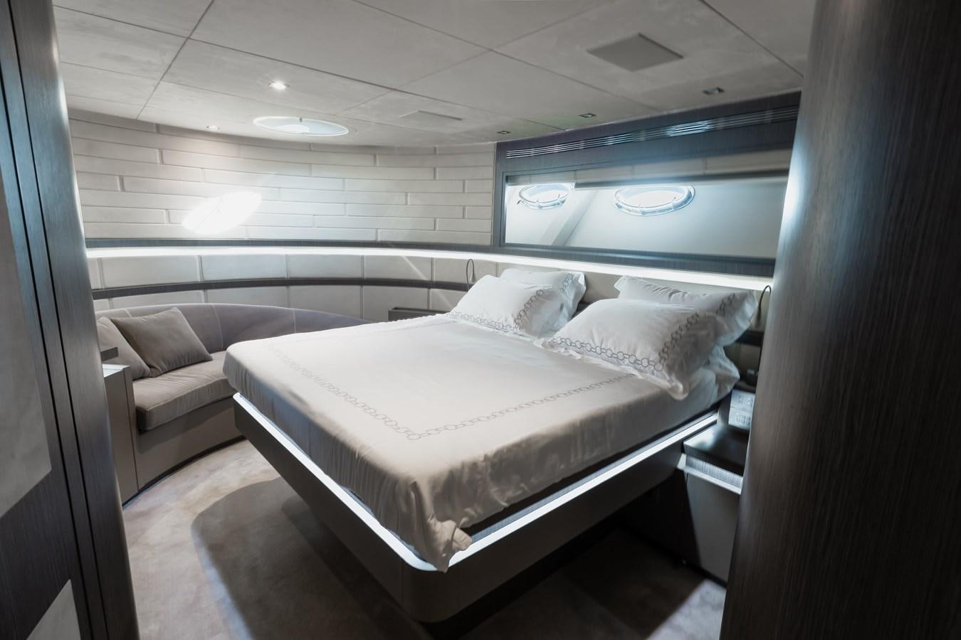 a bed in a room aboard KOLAHA TWO Yacht for Sale