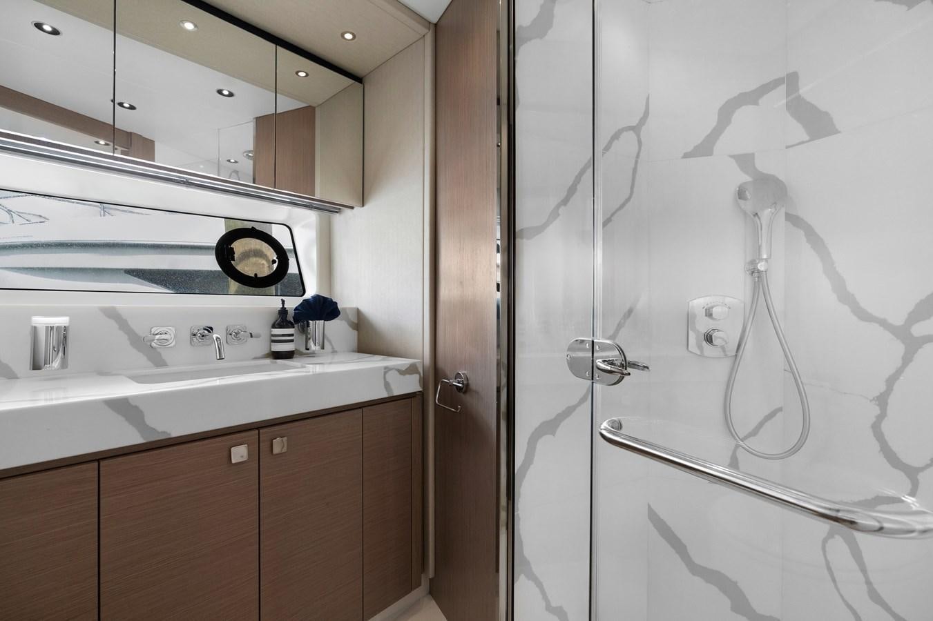 a shower unit and sink aboard MILAMO Yacht for Sale
