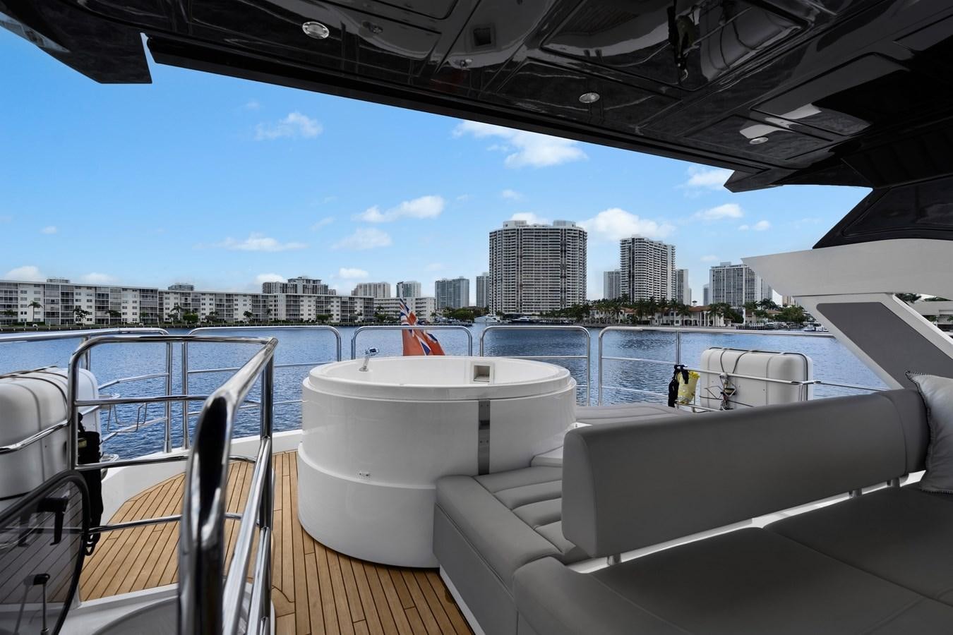 a large balcony overlooking a city aboard MILAMO Yacht for Sale