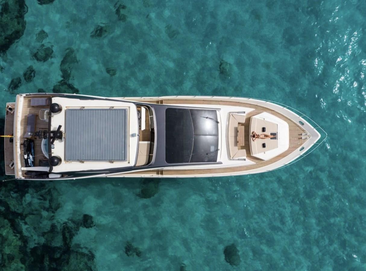 a white rectangular object with a silver square on a green surface aboard BYSCAINE Yacht for Sale
