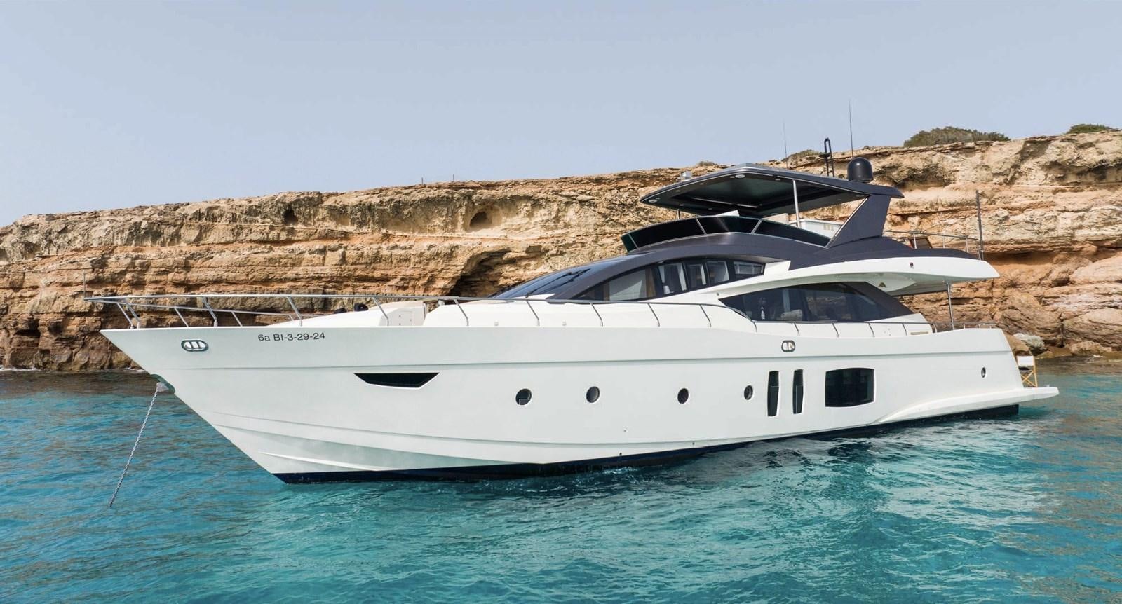 a white yacht in the water aboard BYSCAINE Yacht for Sale