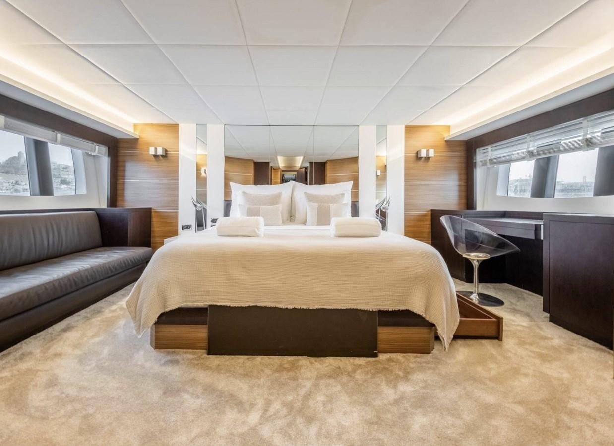 a large bed in a room aboard BYSCAINE Yacht for Sale