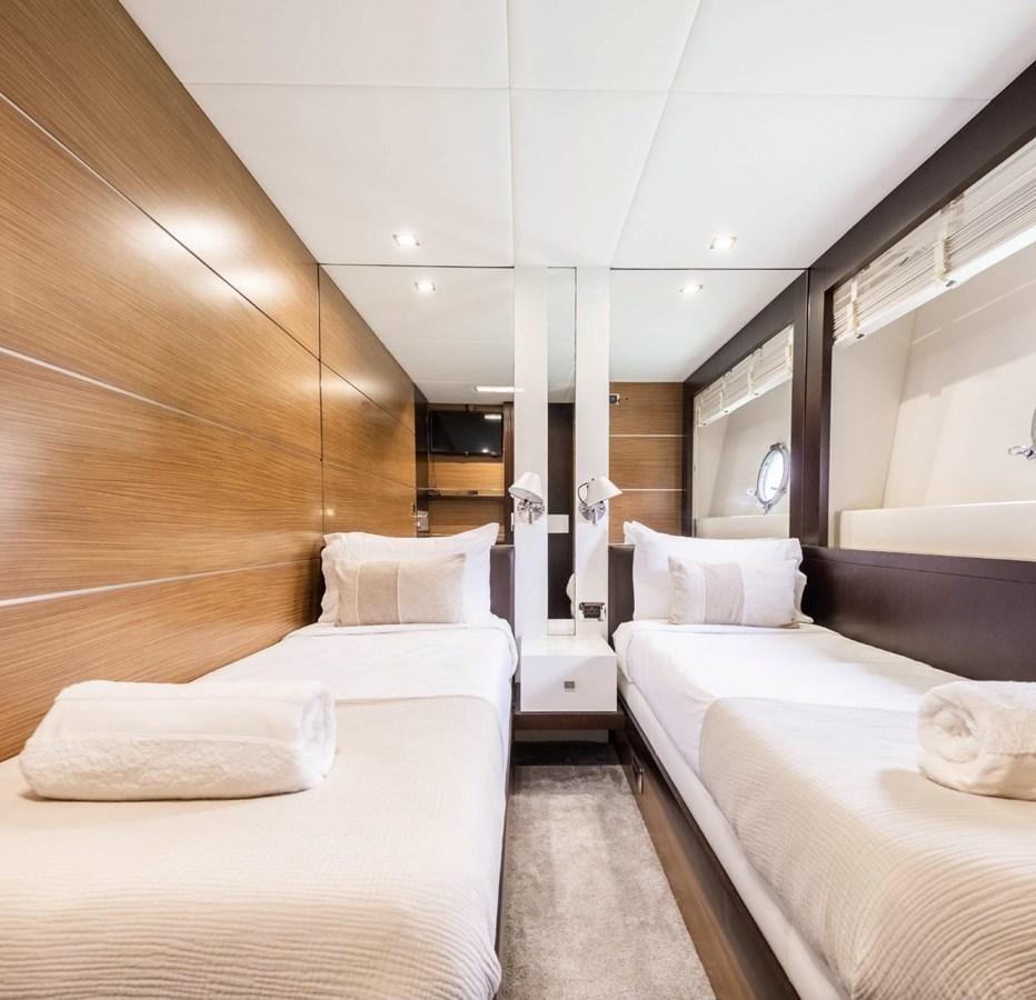 a room with two beds aboard BYSCAINE Yacht for Sale