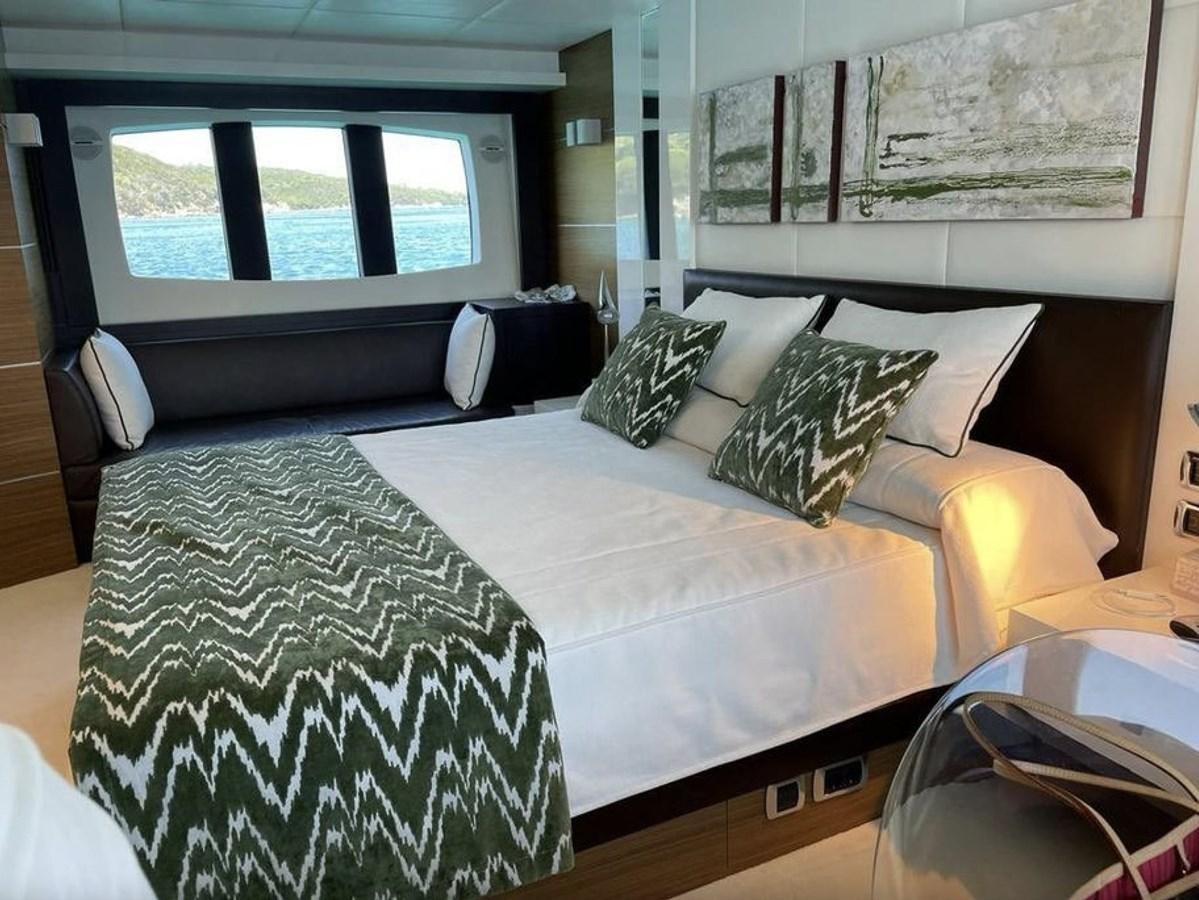 a bed with pillows aboard BYSCAINE Yacht for Sale